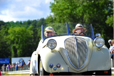 COUPLE IN A 1930S-ERA PEUGEOT, WITH SPECIAL BODY BY EMILE DARL'MAT. PHOTOS BY GREG CLARK AND CASEY KEIL, COURTESY OF LIME ROCK PARK.